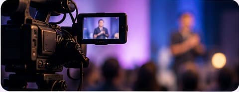 A camera recording a speaker for an online livestream